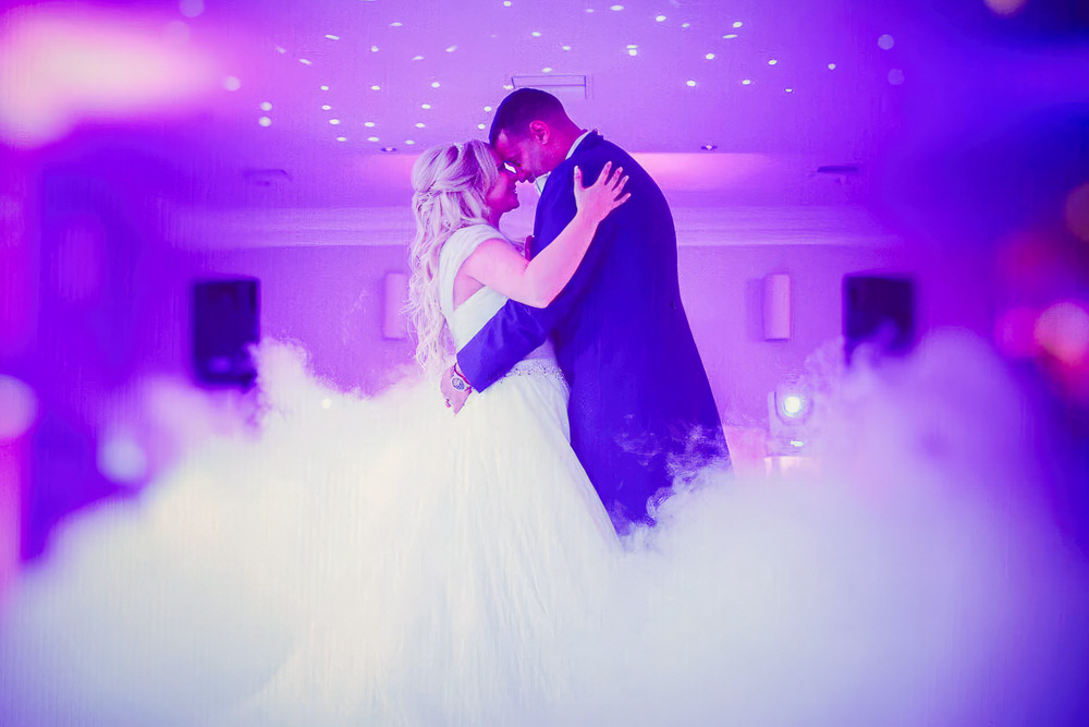Bride and groom first dance with dancing-on-clouds dry ice effect at Hogarths Stone Manor, Worcestershire — the kind of moment your first dance song should match