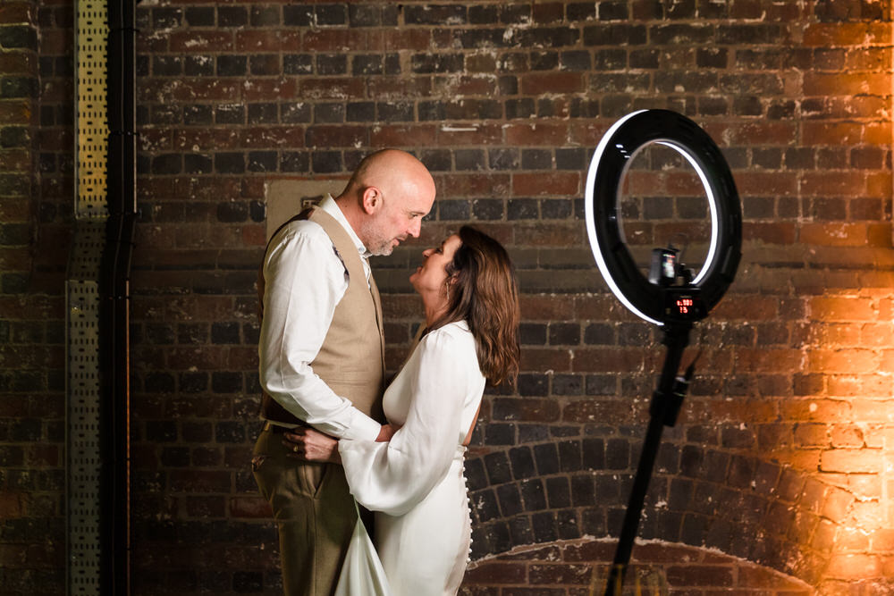 Couple enjoying a 360 photo booth experience at their wedding in Birmingham